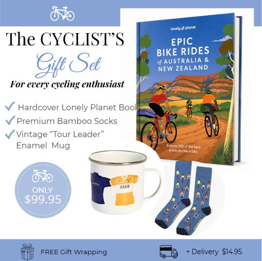 Cyclist's gift set with Lonely Planet book, mug, and socks on a white background
