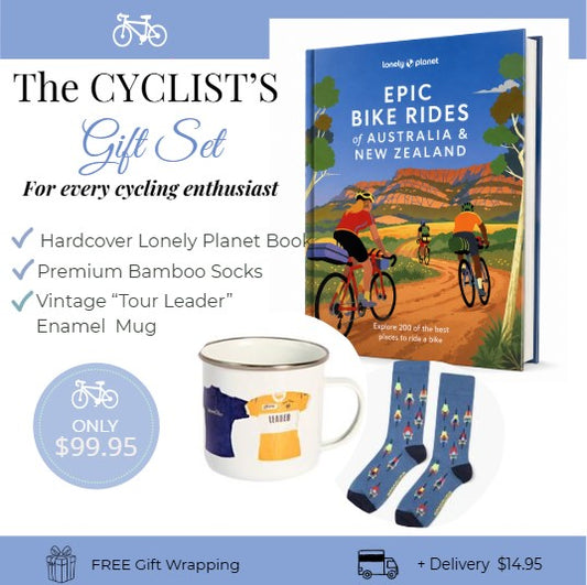 Cyclist's gift set with Lonely Planet book, mug, and socks on a white background
