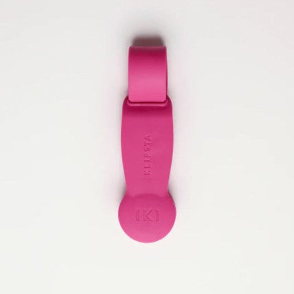 Pink hat clip with brand logo on a white background