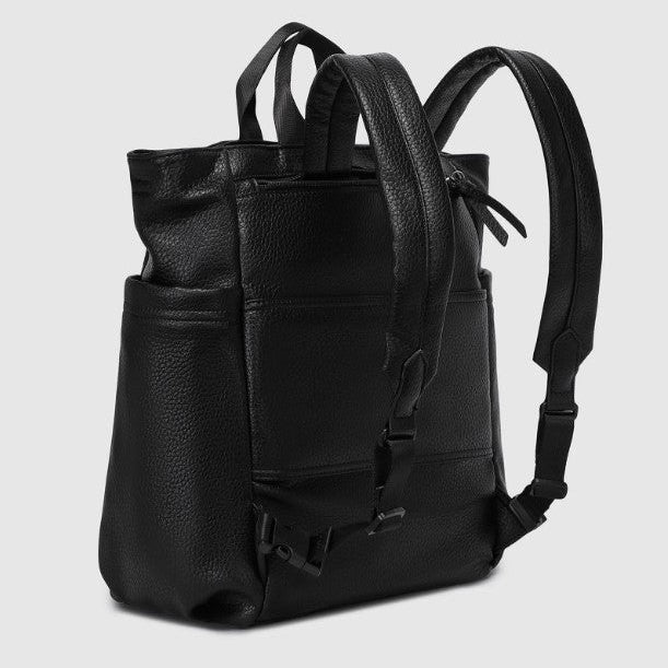 Black leather backpack on a light gray background