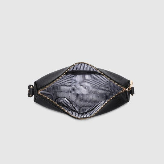 Black bag with gold zipper on a light gray background