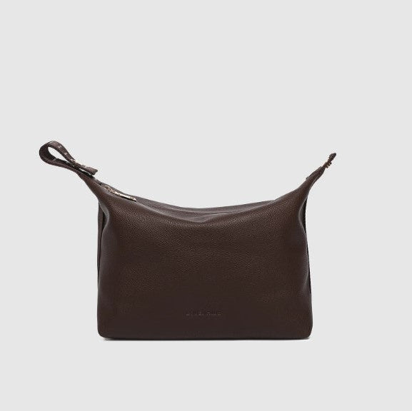 Brown cosmetic bag on a light gray background