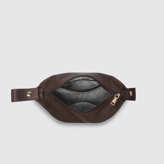 Brown cosmetic bag on a light gray background
