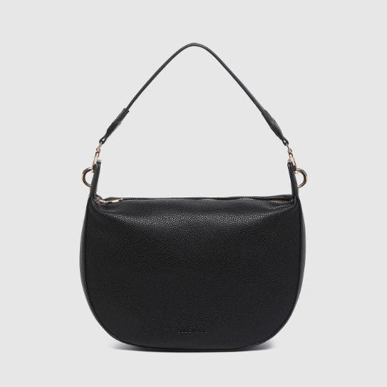 Black handbag with a strap on a light gray background