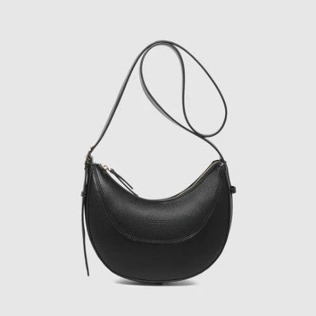 Black shoulder bag on a light gray background