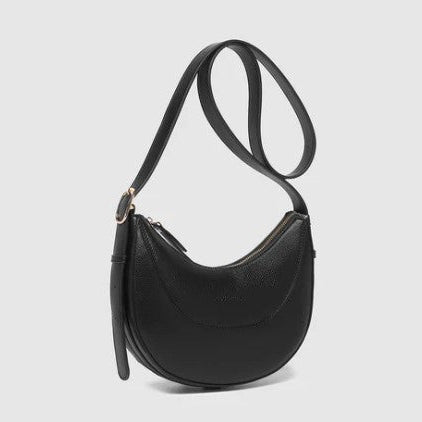 Black shoulder bag on a light gray background