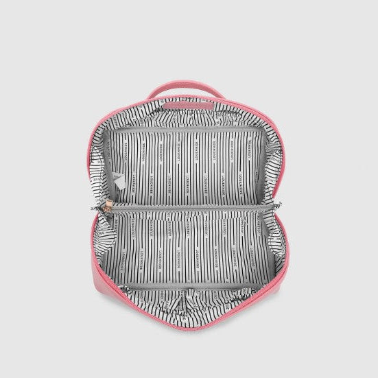 Backpack with pink trim and striped interior on a light gray background