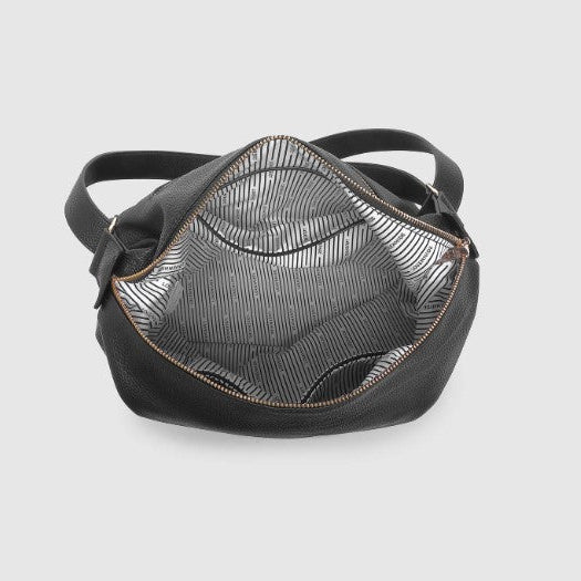 Black handbag with textured pattern on a light gray background