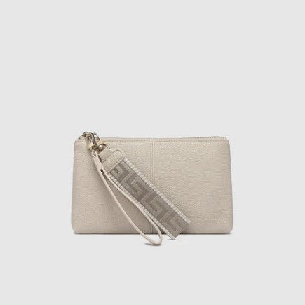 Beige wristlet with strap on a light gray background