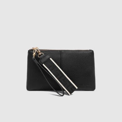 Black clutch bag with a strap on a light gray background