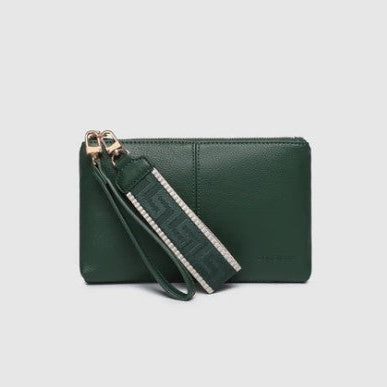 Green clutch bag with a strap on a light gray background