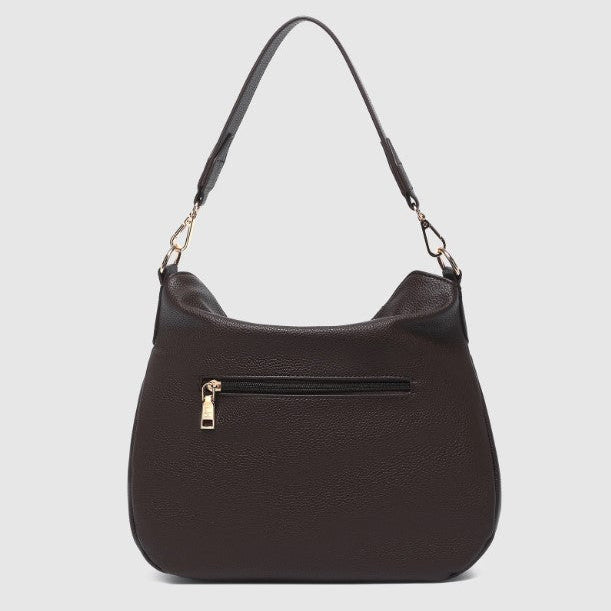 Chocolate handbag with a gold zipper on a light gray background