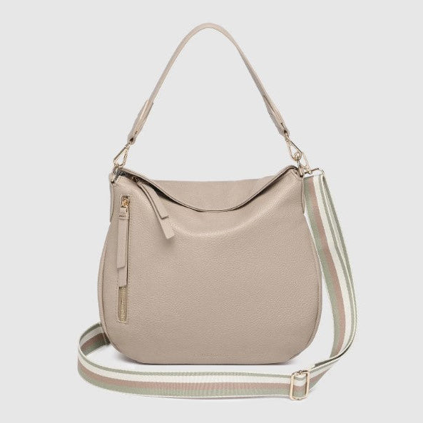 Beige handbag with a strap on a light gray background