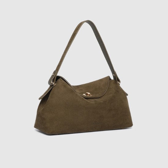 Brown handbag on a light gray background