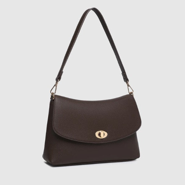A dark brown  shoulder bag with a curved flap, gold-tone hardware, and a matching adjustable shoulder strap, shown against a light gray background.