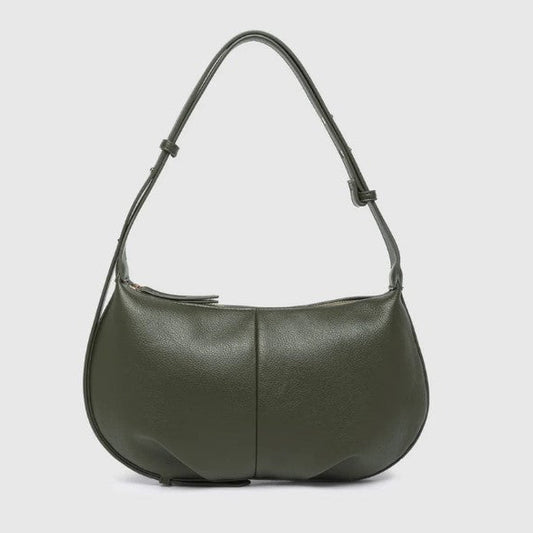 Green handbag on a light gray background