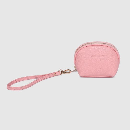 Pink wristlet with a small pouch on a light gray background