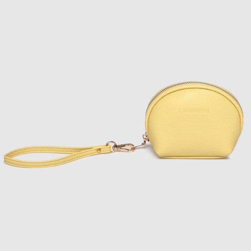 Yellow coin purse with wrist strap on a light gray background
