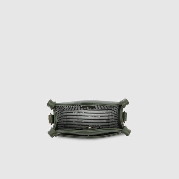 Interior of a green phone bag on a light gray background