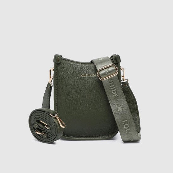 Green handbag with a matching strap on a light gray background