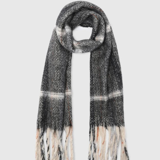 Plaid scarf with fringe on a white background