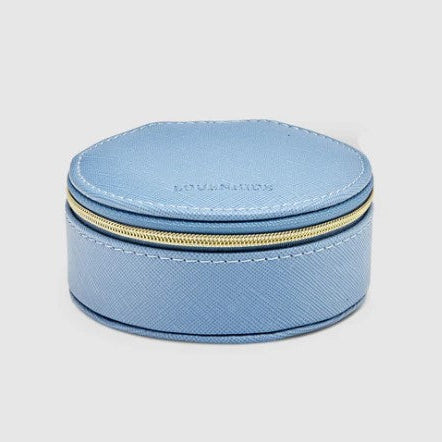 Blue jewelry box with gold zipper on a light gray background