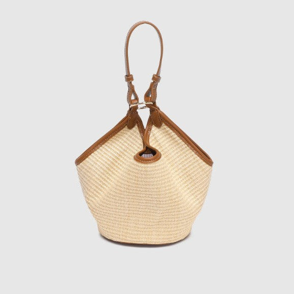 Woven handbag with brown accents on a light gray background