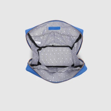 Open blue and white striped bag on a light gray background