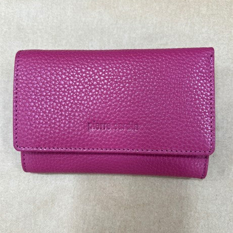 Fuschia wallet with 'Pierre Cardin' branding on a light gray background
