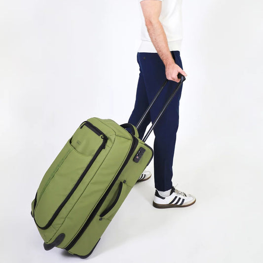 Pierre Cardin  62cm Olive Trolley Case – Water-Repellent Expandable Suitcase lifestyle view