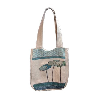 Tote bag with mushroom design on a white background
