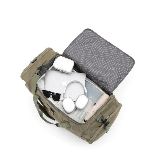 Open beige backpack with geometric patterned pillow and white earbuds on a white background
