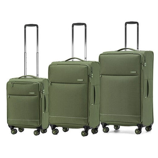 Three green suitcases of different sizes on a white background