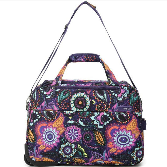 Colorful patterned bag with handle and shoulder strap on a white background