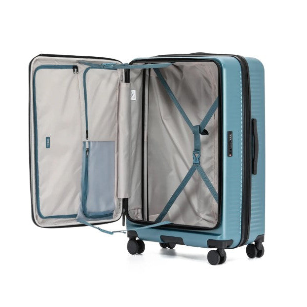 Blue suitcase with open door on a white background