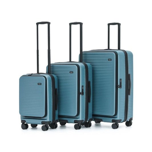 Set of three blue suitcases with black handles and wheels on a white background