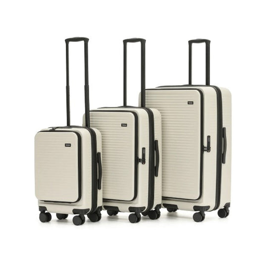 Set of three beige suitcases with black handles and wheels on a white background