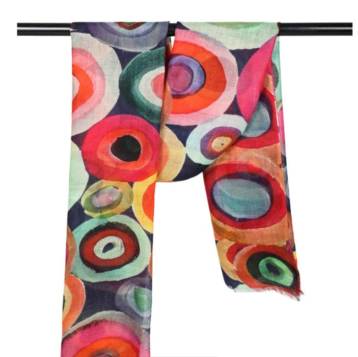 Colorful scarf with circular patterns on a white background