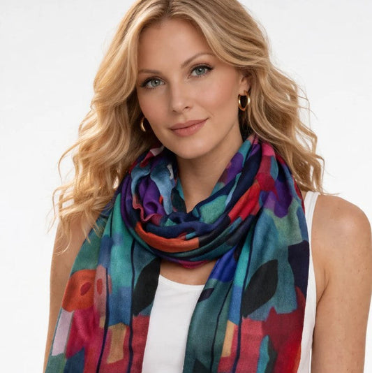 Woman wearing a colorful scarf with a white background